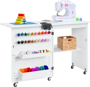 Best Choice Products Folding Sewing Table Multipurpose Craft Station & Side Desk with Compact Design, Wheels, Shelves, Storage Trays, Pegs, Magnetic Doors, Metal Doorknobs - White