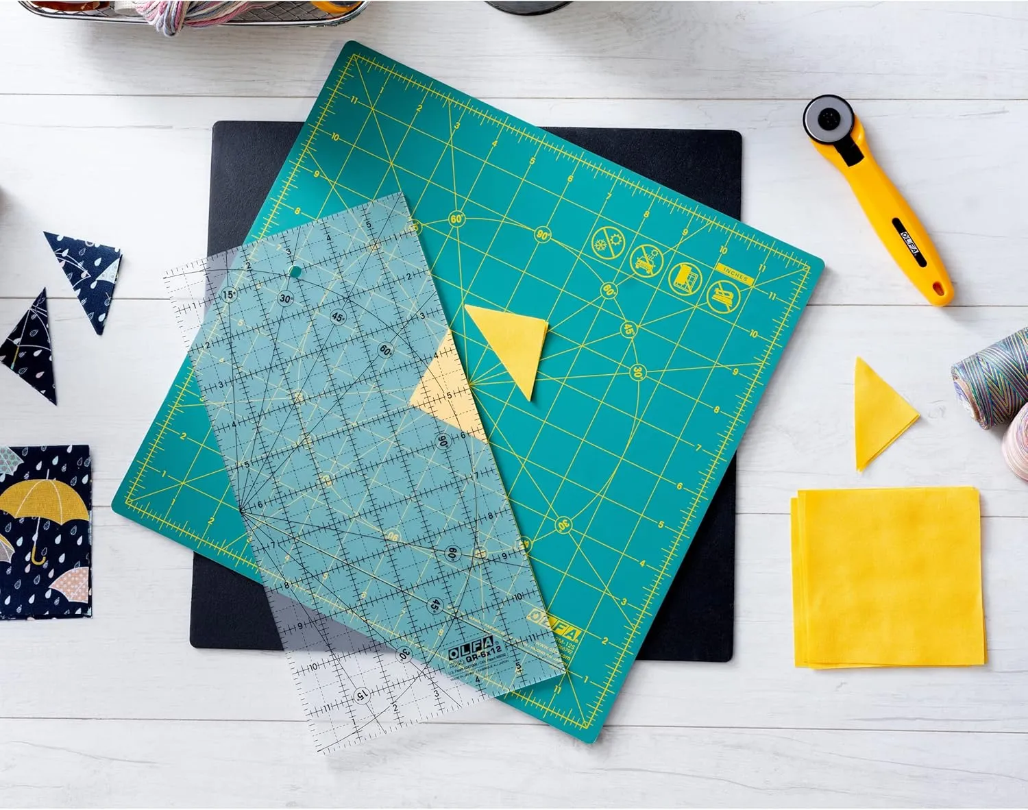 OLFA 12" x 12" Rotating Cutting Mat (RM-12S) - Self Healing 12x12 Inch Square Rotary Mat with Grid for Fabric, Sewing, Quilting, & Crafts, Rotates 360 Degrees, Use with Rotary Cutters (Green)