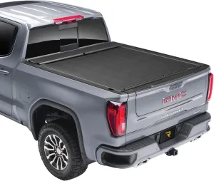 RealTruck Roll-N-Lock M-Series Retractable Truck Bed Tonneau Cover | LG206M | Fits 2007 - 2007 Chevy/GMC Silverado/Sierra w/OE Rail Caps 6' 6" Bed (78")